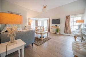 Μια τηλεόραση ή/και κέντρο ψυχαγωγίας στο Appartementen Villa La Palette