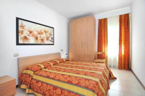 Een bed of bedden in een kamer bij Milan