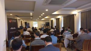 a group of people sitting at tables in a room at Longoz Hotel in Igneada