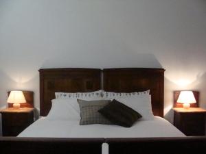 Posteľ alebo postele v izbe v ubytovaní Gianduja B&B
