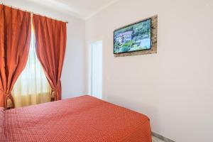 TV a/nebo společenská místnost v ubytování Hotel Cavalieri Del Mare