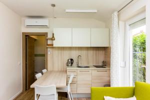 Kuchyň nebo kuchyňský kout v ubytování Apartments Villa Nina