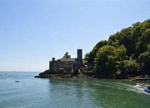 a castle on an island in the water at 310 Norton Park in Dartmouth