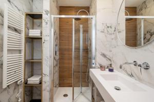 Koupelna v ubytování NUE SUITES