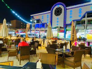 A restaurant or other place to eat at Panda Grey with balcony Hurghada center