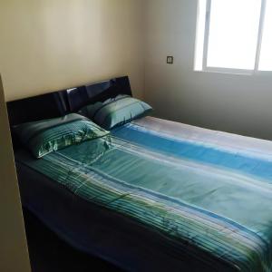 Postel nebo postele na pokoji v ubytování Alcudia Smir