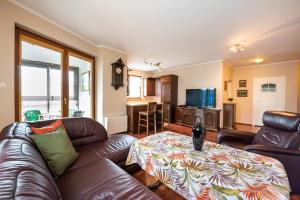 Posedenie v ubytovaní Arkadia Homely Apartament