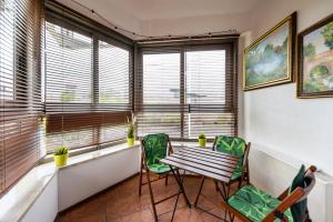 Posedenie v ubytovaní Arkadia Homely Apartament