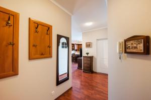 Televízia a/alebo spoločenská miestnosť v ubytovaní Arkadia Homely Apartament