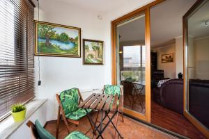 Posedenie v ubytovaní Arkadia Homely Apartament