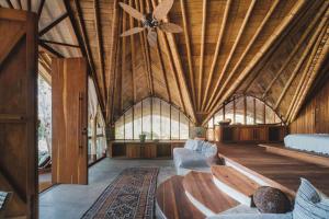 A bed or beds in a room at Gitana del Mar Boutique Beach Resort