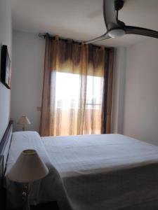 Katil atau katil-katil dalam bilik di Apartamento en Deltebre Lo Delta