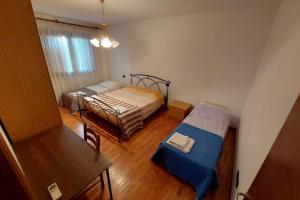 Ένα ή περισσότερα κρεβάτια σε δωμάτιο στο La Casa di M : D M.