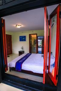 Postel nebo postele na pokoji v ubytování Harmony Hoian Homestay