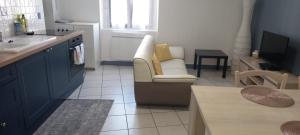 Kuchnia lub aneks kuchenny w obiekcie Joli appartement climatisé