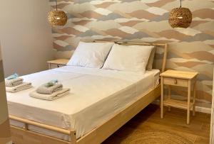 Postel nebo postele na pokoji v ubytování ViSun Apartment 1