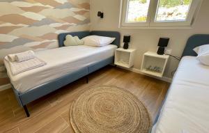 Postel nebo postele na pokoji v ubytování ViSun Apartment 1