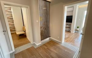 TV a/nebo společenská místnost v ubytování ViSun Apartment 1