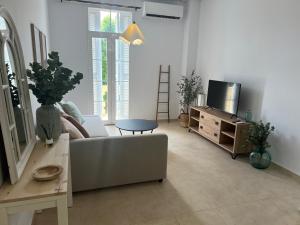 Televízia a/alebo spoločenská miestnosť v ubytovaní Estudio canela