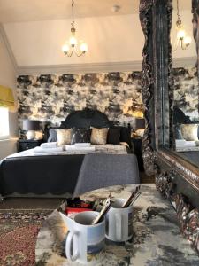 Postel nebo postele na pokoji v ubytování The Clontarf