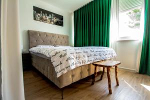 Posteľ alebo postele v izbe v ubytovaní Apartment Sika