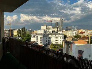 a view of a city from a balcony at Do Gdyni in Gdynia
