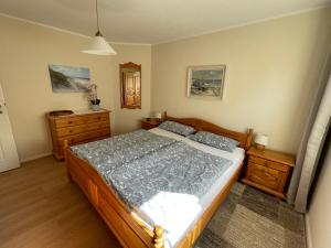 Ένα ή περισσότερα κρεβάτια σε δωμάτιο στο Meine Ferienwohnung