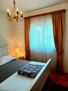 Posteľ alebo postele v izbe v ubytovaní Apartments Vrisak