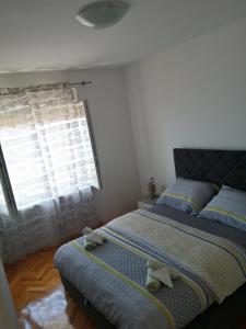 Posteľ alebo postele v izbe v ubytovaní Sunshine