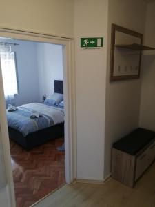 Posteľ alebo postele v izbe v ubytovaní Sunshine