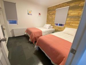 Ένα ή περισσότερα κρεβάτια σε δωμάτιο στο CABAÑAS PAMPAS AUSTRALES