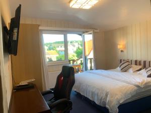 Postel nebo postele na pokoji v ubytování Hotel Austria