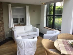 Posezení v ubytování Gîte des Grandsarts