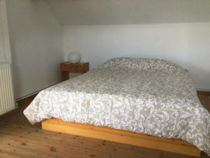 Postel nebo postele na pokoji v ubytování Gîte des Grandsarts