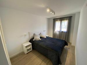 Posteľ alebo postele v izbe v ubytovaní Apartamento Cala Montgo