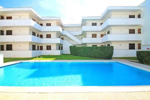 Bazén v ubytovaní Apartamento Cala Montgo alebo v jeho blízkosti