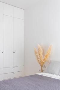 Posteľ alebo postele v izbe v ubytovaní S35 Apartments Gdynia Orłowo