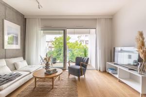 TV a/nebo společenská místnost v ubytování S35 Apartments Gdynia Orłowo