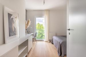 Posteľ alebo postele v izbe v ubytovaní S35 Apartments Gdynia Orłowo
