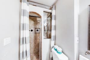 a bathroom with a shower and a sink at Polk 401 in Nashville