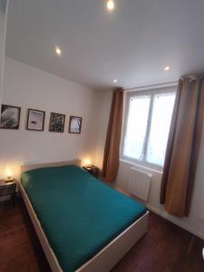 Postel nebo postele na pokoji v ubytování Appartement hyper centre de Montargis