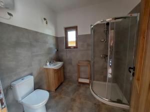 Fotografie z fotogalerie ubytování Domki Pod Lasem v destinaci Ostrowo + 22 fotografií