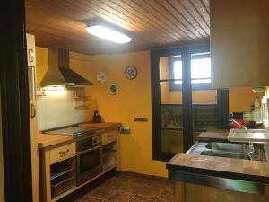 Kuchnia lub aneks kuchenny w obiekcie La Maison du Carlit