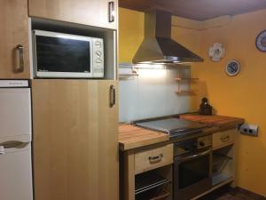 Kuchnia lub aneks kuchenny w obiekcie La Maison du Carlit