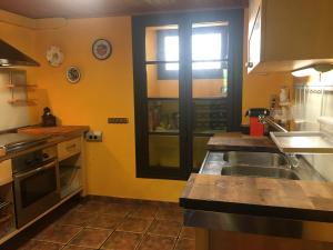Kuchnia lub aneks kuchenny w obiekcie La Maison du Carlit