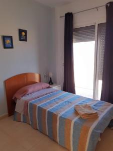Posteľ alebo postele v izbe v ubytovaní Dúplex centrico, luminosos y bonitas vistas.