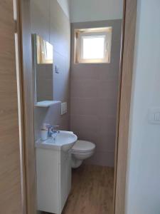 Koupelna v ubytování Apartment MAIO + 10 fotografií