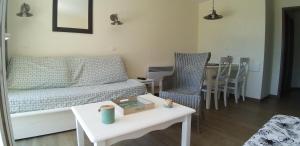 Posedenie v ubytovaní CAP COZ plage piscine et jardin