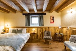 Postel nebo postele na pokoji v ubytování Chambres d'hôtes La Moraine Enchantée