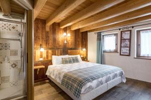 Postel nebo postele na pokoji v ubytování Chambres d'hôtes La Moraine Enchantée
